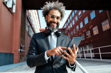Image of a young entrepreneur working outdoor the office