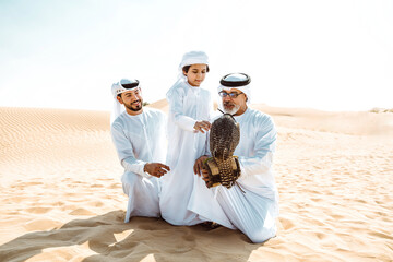 Three generation family making a safari in the desert of Dubai