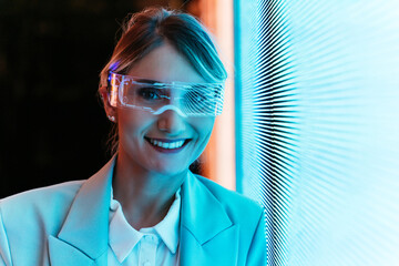 business woman with cyborg bionic arm and augmented reality visor.