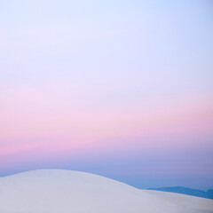 Pink sunset sky over white sdune, White Sands, New Mexico, United States