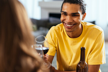 Modern multiethnic unstereotyped couple lifestyle moments at home.