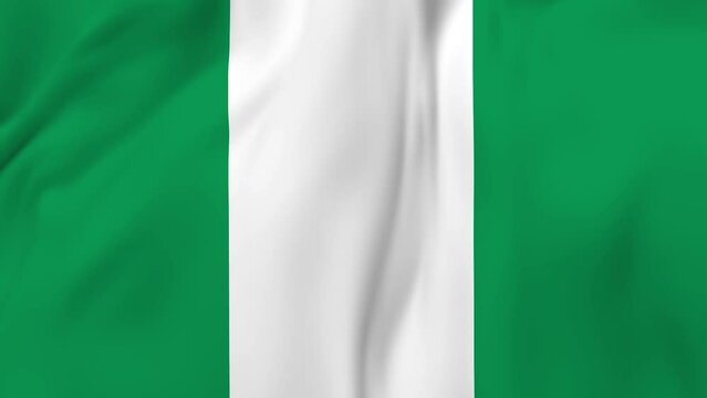 Arising map of Nigeria and waving flag of Nigeria in background. 4k resolution video.
