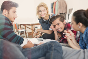 College students studying on bed