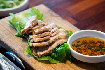 Fresh and delicious iron pan-fried black pork meal in Jeju Korean restaurant.