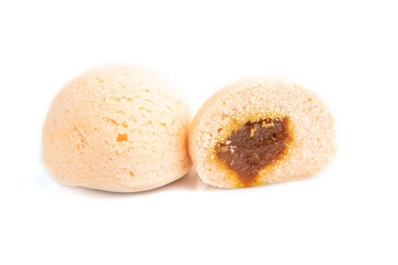 Japanese rice sweet buns mochi filled with jam isolated on white. side view.
