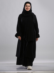 saudi arabian woman lady walking wearing  hijaab looking infront