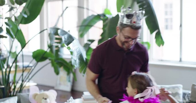 Father, princess dance and home with crown and fun with young child and smile playing dress up. Love, support and dancing of a dad and girl in a living room in a house with funny costume of a kid