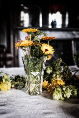 Flowers In A Vase & Strewn On A Table In An English Manor House