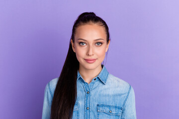 Fototapeta premium Portrait of young teenage girl looking at camera with serious pensive expression caucasian model posing