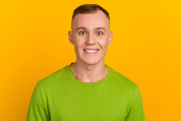 Young casual man portrait isolated on yellow color background
