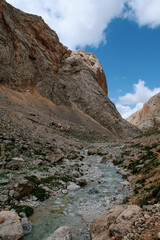 Fototapeta premium Mountain river with cloudy sky