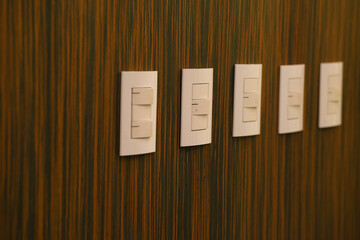 white switches. detail. interior photo.
