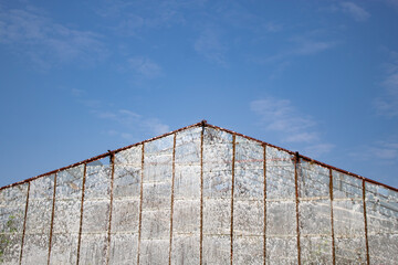 Obraz premium glass old church on the background of the blue sky, bottom view