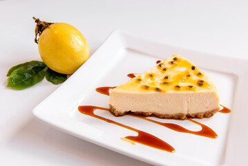 passion fruit cheesecake on white background