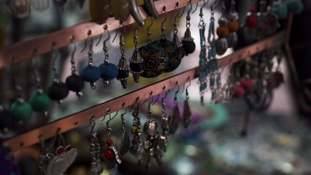 Close-up of artisan earrings in Marrakesh souk, Morocco