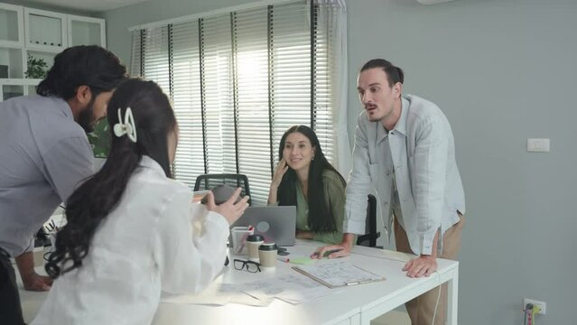 A diverse group of coworkers brings their ideas to life in a captivating 3D model, A small startup team presents new technology through the 3D model, and architecture team represents the 3D architect