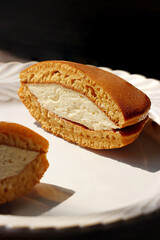 Dorayaki with cheese filling isolated on white background