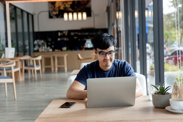 asian man work using computer hand typing laptop keyboard contact us.student study learning education online.adult professional people chatting search at office.concept for technology device business