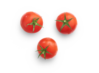 Three ripe juicy red tomatoes isolated against a transparent background