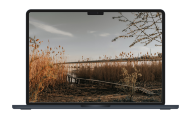 June 6, 2023, Bratislava, Slovakia - Render the new MacBook Air 13 and 15 inches in Midnight color. A new big MacBook with bangs. Mockup of the frontal view. Laptop layout with a transparent screen.