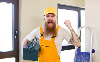 red hair man looking angry, annoyed and frustrated repairing home. handyman concept