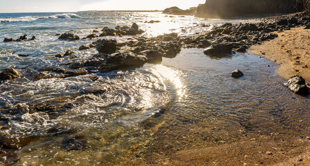 Colored Glass Mixed With Sand and Rocks, Glass Beach, Port Allen, Kauai, Hawaii, USA