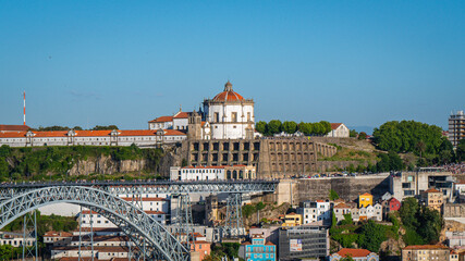 Panoramic view of the old city of Porto, Dom Luis metallic bridge and the Pilar monastery, Portugal.
