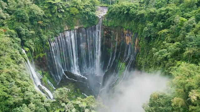 Aerial view of Tumpak Sewu waterfall. Java Island, Indonesia