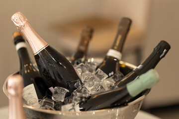 Bottles of champagne in a bucket filled with ice