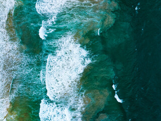 Sea surface aerial view,Bird eye view photo of crashing waves and water surface texture,Dark sea background, Beautiful nature seascape,Amazing view sea background