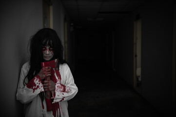 Portrait of asian woman make up ghost,Scary horror scene for background,Halloween festival...