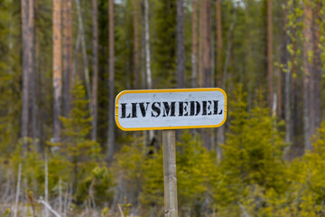 Boliden, Sweden A homemade sign on a country road says Livsmedel in Swedish, which means groceries.