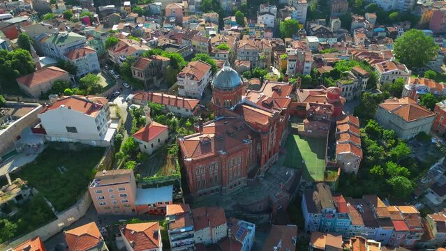   Great School of the Nation - Greek architecture Balat district in Istanbul, T&uuml;rkiye. Aerial flying drone video panorama