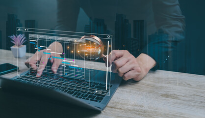 Analyst working with Business Analytics and Data Management System on computer Business analytics and data management systems to generate reports with corporate KPIs.