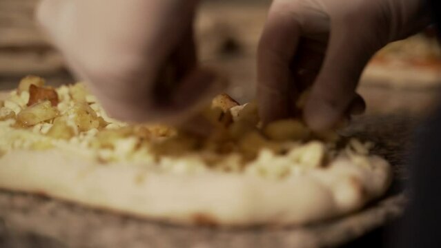 preparing pizza