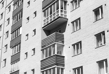 Architectural design of apartment buildings colorless. External view of a new building, residential building, apartments black and white. Modern houses, apartments.Facade of a high-rise apartment