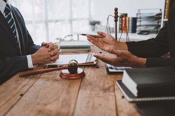 Businessmen and lawyers, lawyers discuss and read details of treaty documents before signing investment contracts in financial business. justice concept