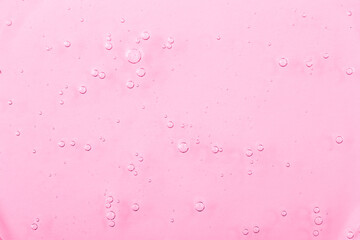 Cosmetic gel, serum transparent sample. Liquid cream with bubble texture. Gel texture of a cosmetic product. Clear liquid lotion for skin care.