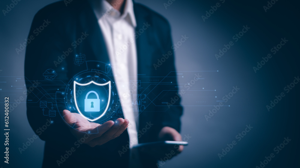 Aufkleber businessman showing protection icon on virtual screen on hand, cyber security concept technology pro