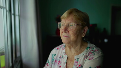 Close-Up of Senior Pensive Woman_s Face Contemplating Life, Thoughtful Expression as She Looks Out...