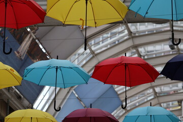 Fototapeta na wymiar Colorful umbrella rainbow art installation