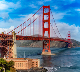 Incredible panoramic view of the Golden Gate of San Francisco in California, USA under a beautiful blue sky and ocean. Seen from the viewpoint of the Californian city's waterfront. American concept.