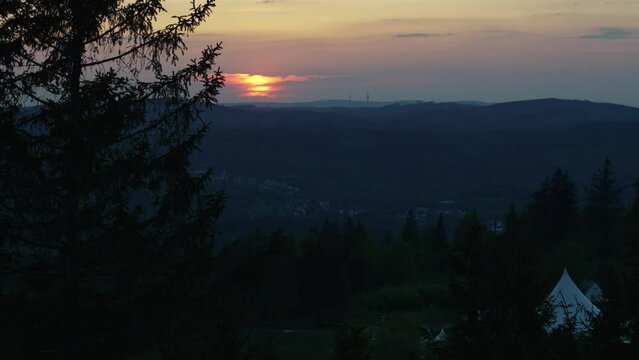 sunset over the mountain range of the Rothaargsteig close to Luetzel.
