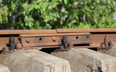 The place of connection of the rails with the help of a screwed lining