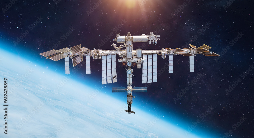 Poster ISS space station on orbit of the Earth planet. Astronauts in space. Elements of this image furnished by NASA