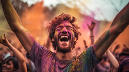 Obraz premium Handsome man / boy having fun at a music festival / concert in the summer