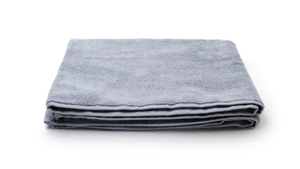 Folded terry towel isolated on white.