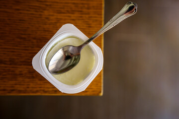 natural yogurt and teaspoon, Majorca, Balearic Islands, Spain
