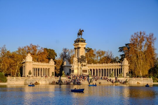 El Retiro Park in Madrid, Spain with boats in water