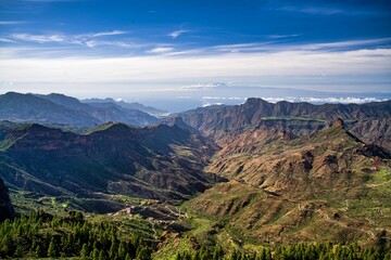 Fototapeta premium Roque Nublo under a cloudy sky on a sunny day, Gran Canary, Spain